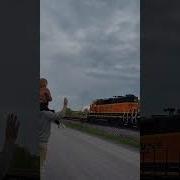 Waving While Train Goes By